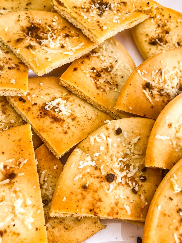 Pita toasts with cheese and garlic